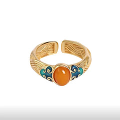 Amber Enamel Ring – front view on white background showing carved inner band detail