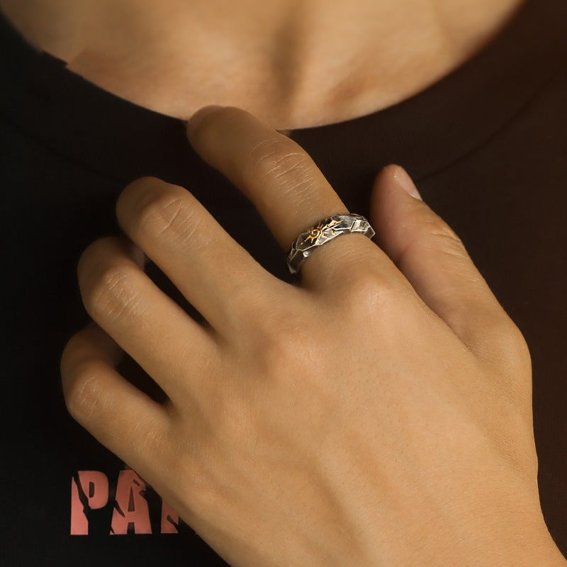 Self-Discipline Ring – Silver sun ring worn on index finger over black shirt, everyday spiritual jewelry