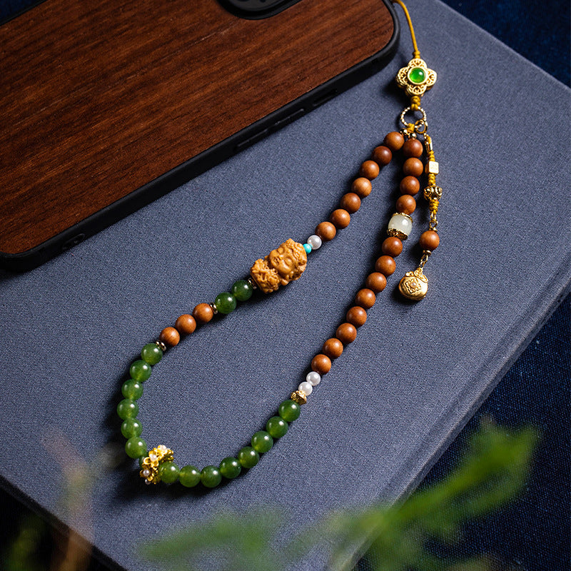 Chalcedony & Sandalwood Fu Bag Phone Charm, lifestyle shot
