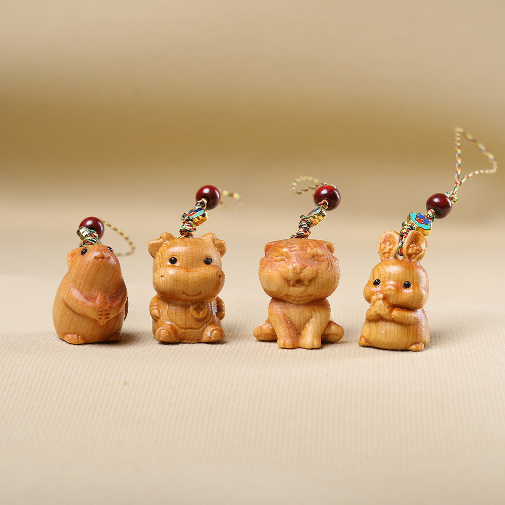 鼠牛虎兔四款崖柏生肖钥匙扣组合展示