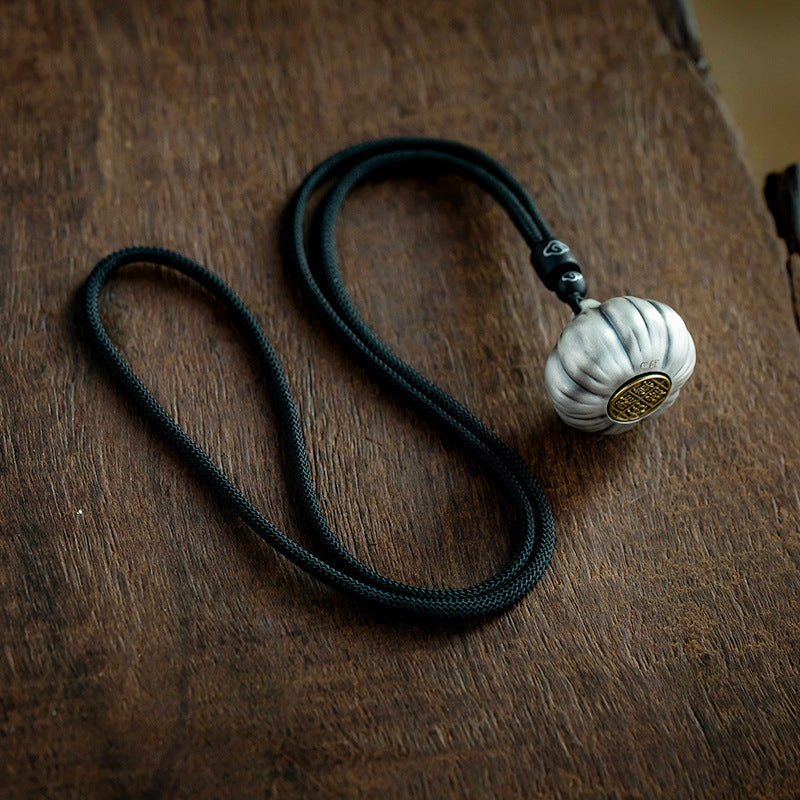 Thai Silver Garlic Protection Charm, close-up detail, pendant necklace