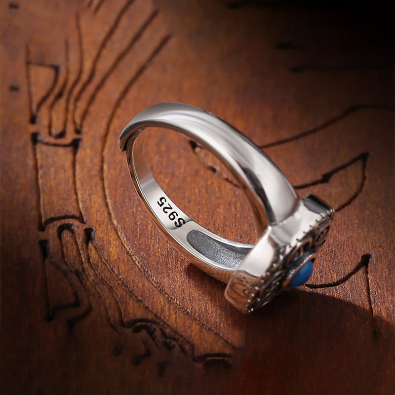 Tibetan Om Mani Padme Hum Ring – Red and blue pair on dark wood, Tibetan ring