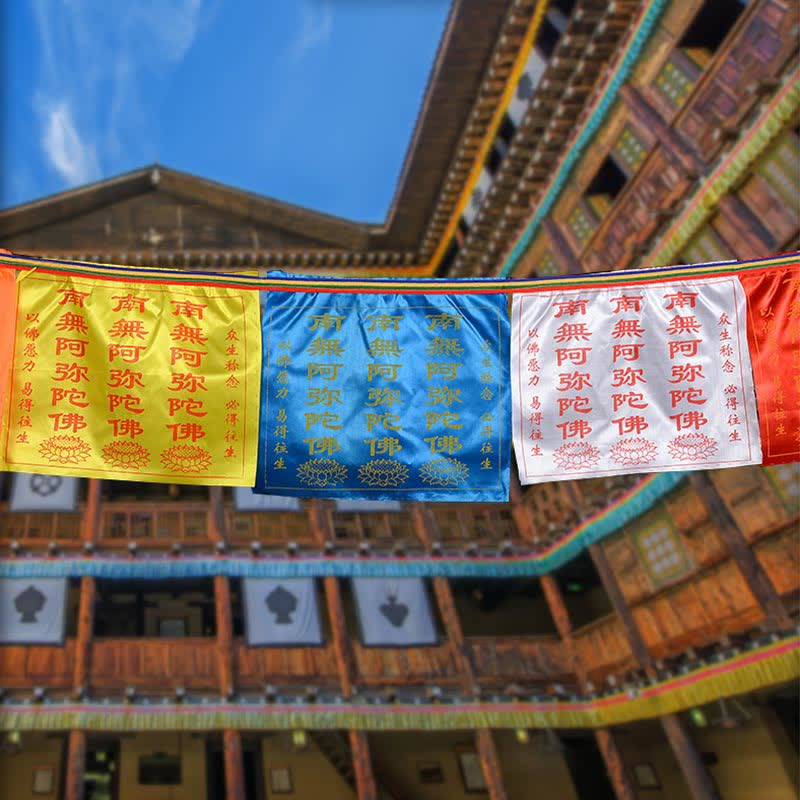 Tibetan Windhorse Lotus Prayer Flag Set - colorful flags strung at temple with blue sky
