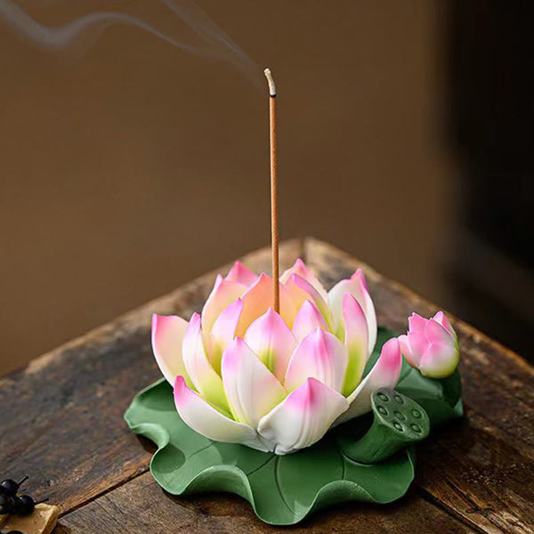 Lotus Ceramic Incense Burner - blooming pink lotus with lit incense on aged wood, detailed petal gradient