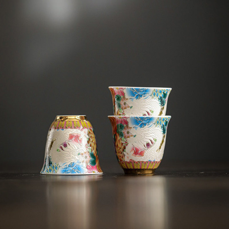 Dragon Phoenix Ceramic Teacup - Inverted and stacked display showing white phoenix relief, Detailed artistry