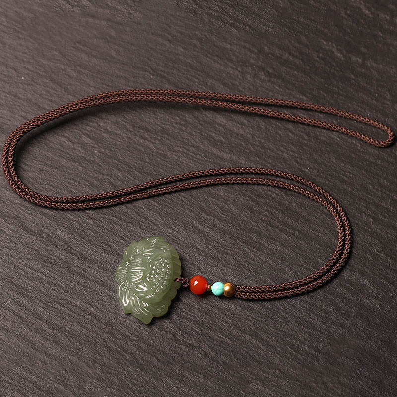 Cyan Jade Lotus Flower Necklace – full cord necklace with carved lotus on dark stone, mindful