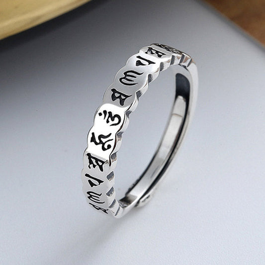925 Sterling Silver Om Mani Padme Hum Ring – silver band with engraved Tibetan mantra, three-quarter view, spiritual ring