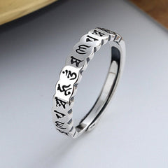 925 Sterling Silver Om Mani Padme Hum Ring – silver band with engraved Tibetan mantra, three-quarter view, spiritual ring