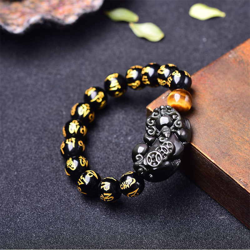 Obsidian PiXiu Rainbow Obsidian Wealth Bracelet – Black obsidian bracelet with PiXiu and tiger eye on wood