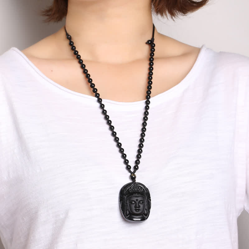 Black Obsidian Avalokitesvara Pendant - carved Guanyin Buddha head on beaded chain worn on model, Protective