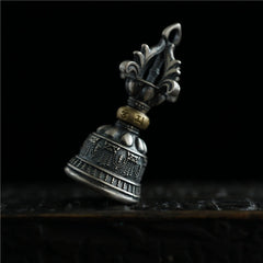 925 Silver Dorje Bell Pendant – Low angle view of Tibetan bell with engraved gold mantra ring