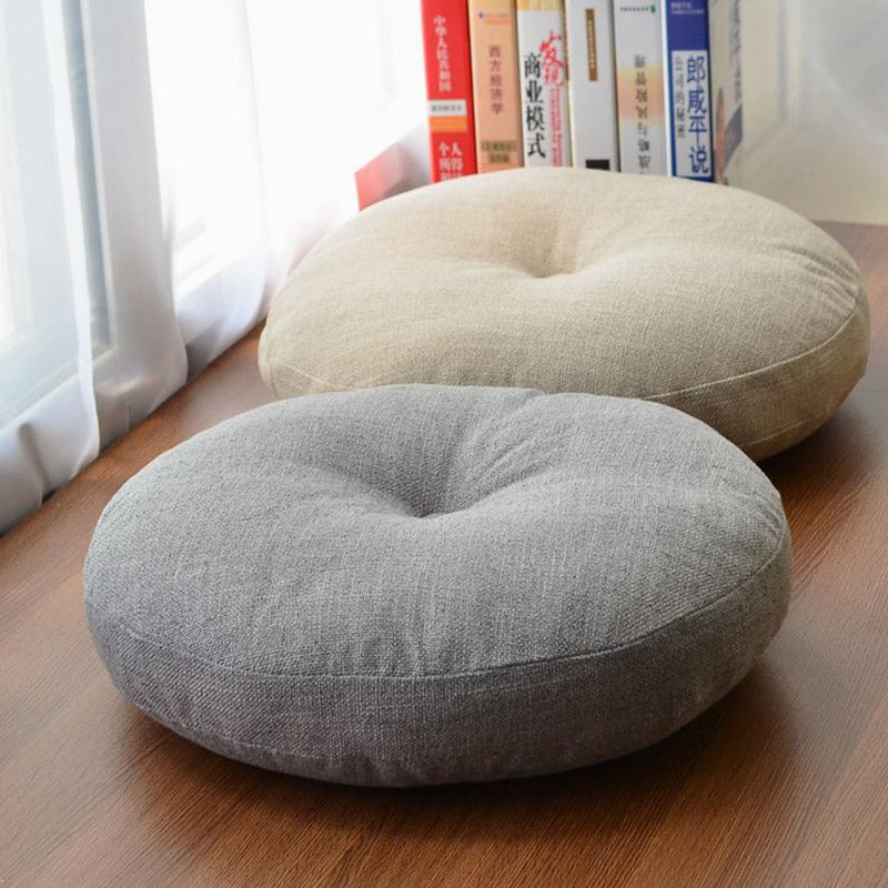 Lotus Linen Meditation Cushion – Gray and oatmeal pair near bookshelf, linen texture