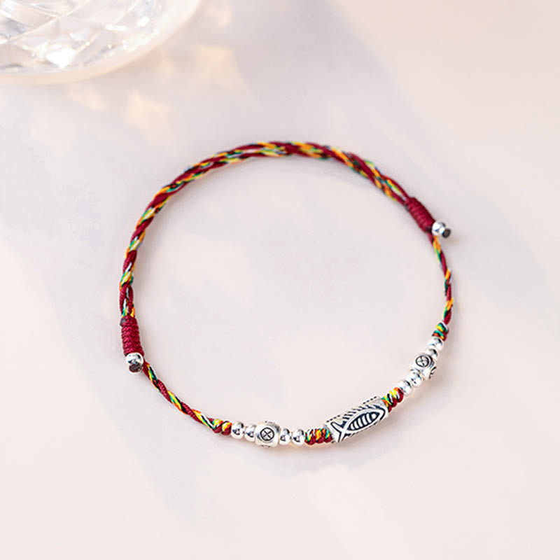 925 Koi Braided Bracelet - on wrist showing colorful braid and koi pendant, daily wear
