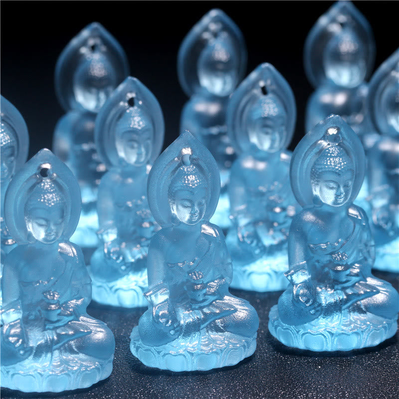 Blue Tathagata Medicine Buddha Liuli Crystal Necklace – multiple frosted aqua Buddha charms in grid formation, pointed ovoid halos, black matte surface luminous effect