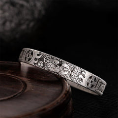 Sterling silver Pixiu wealth bracelet with bat and coin motifs, Zhao Cai Jin Bao inscription, Heart Sutra engraving and antique oxidized finish
