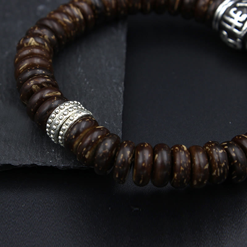 Om Mani Padme Hum Coconut Shell Bracelet – low overhead on slate, dotted silver spacer