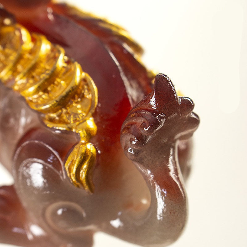 PiXiu Coin Tea Pet – Close-up of gold copper coins on red-brown PiXiu back, wealth symbol detail