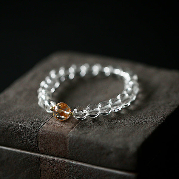 Black Obsidian White Crystal Onyx Dragon Bracelet - Transparent beads with amber inclusion on dark vintage books, Protection