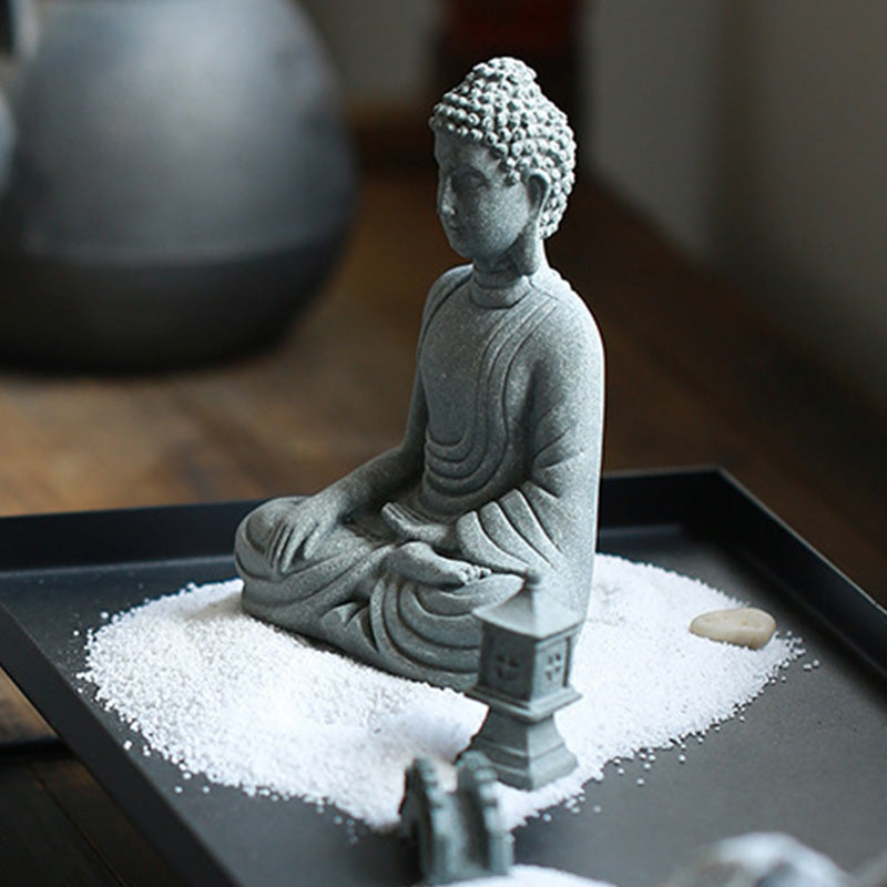 Sitting Meditation Buddha Sandstone Statue – elevated angle zen garden, lantern, sand, peace
