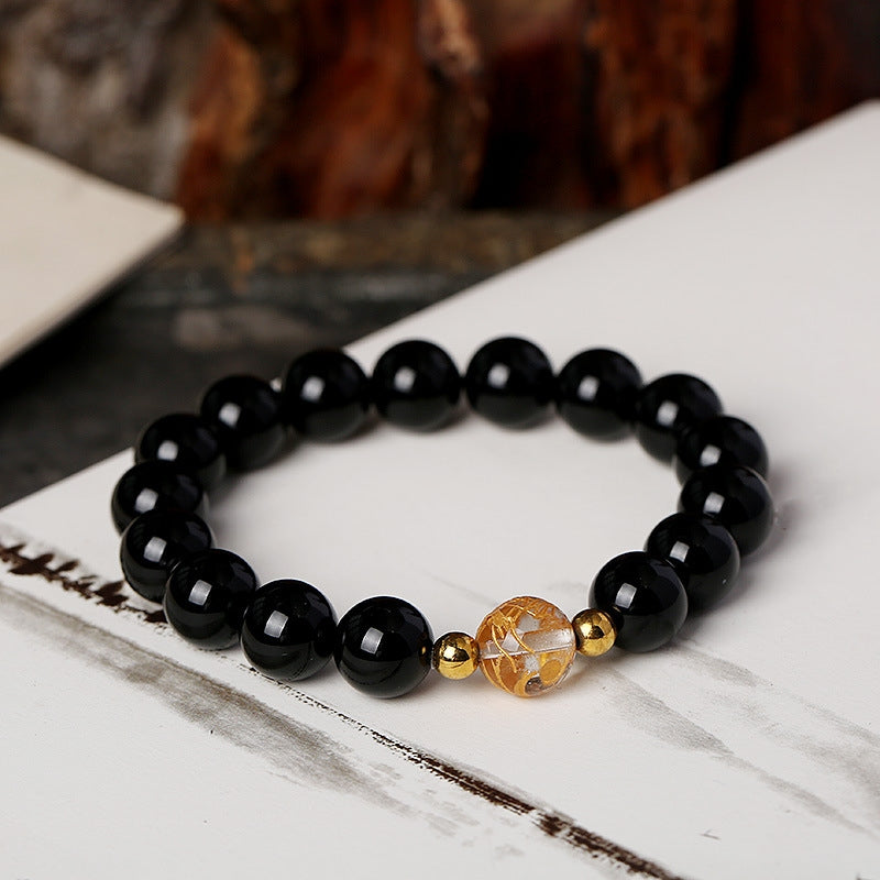 Black Obsidian White Crystal Onyx Dragon Bracelet - Beaded bracelet with golden accent bead on ink wash paper, Luck