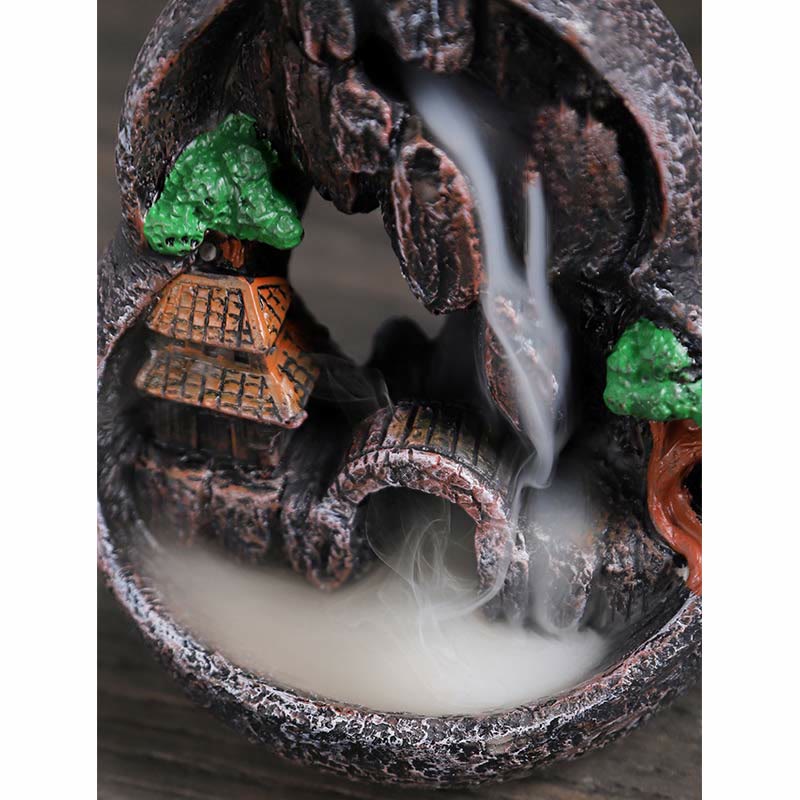 Resin Backflow Incense Burner – Miniature village with pagoda, trees and dense smoke waterfall in stone basin, zen