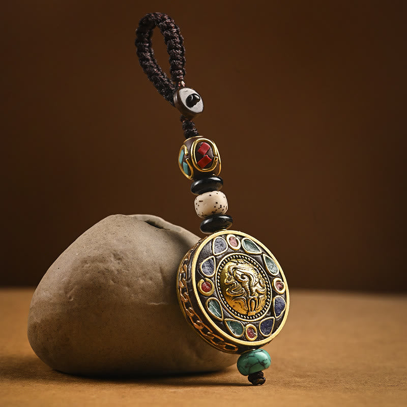 Tibetan Bodhi Seed Peace Key Chain – Gold Ganesha medallion with turquoise coral inlay on cord, spiritual charm Hauptbild