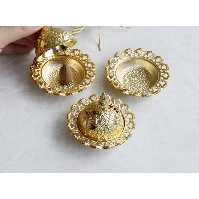 Tibetan Gold Mini Meditation Incense Burner – Three gold burners flat lay, one open showing incense cone placement