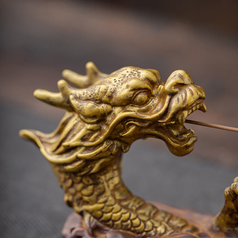 Dragon Protection Incense Burner – held in two hands with smoke rising, traditional ceremonial use, spiritual