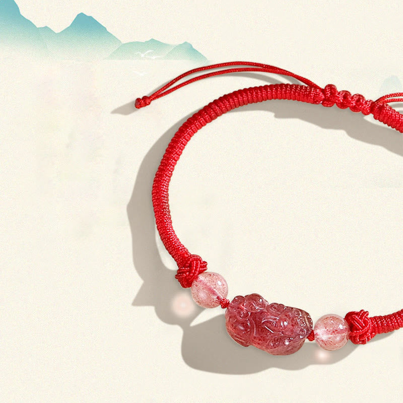 Silver Sheen Obsidian Bracelet – Close-up red bracelet with blue mountain illustration