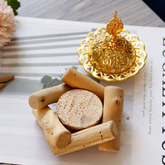 Gold Alloy Mini Incense Burner – filigree holder displayed on rustic driftwood stand with botanical styling, mini incense burner