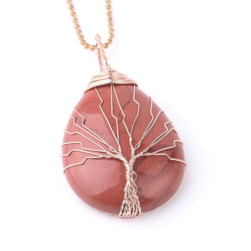 Quartz Crystal Tree of Life Necklace – red jasper teardrop pendant, rose gold wire tree, white background