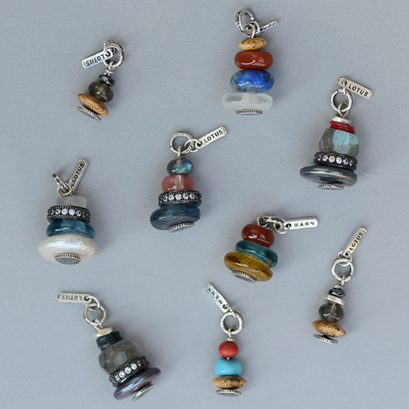 Zen Cairn Crystal Pendant – nine stacked bead pendants with LOTUS tags in multi-colors on gray, gemstone charms