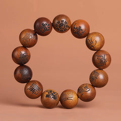 Lightning Struck Jujube Wood Taoist Scripture Bracelet - Twelve bead wood bracelet with Bagua trigram centerpiece, spiritual healing bracelet