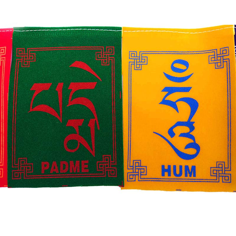 Tibetan Prayer Flags – Green and yellow Padme Hum flags with intricate corner designs, Buddhist fabric decor