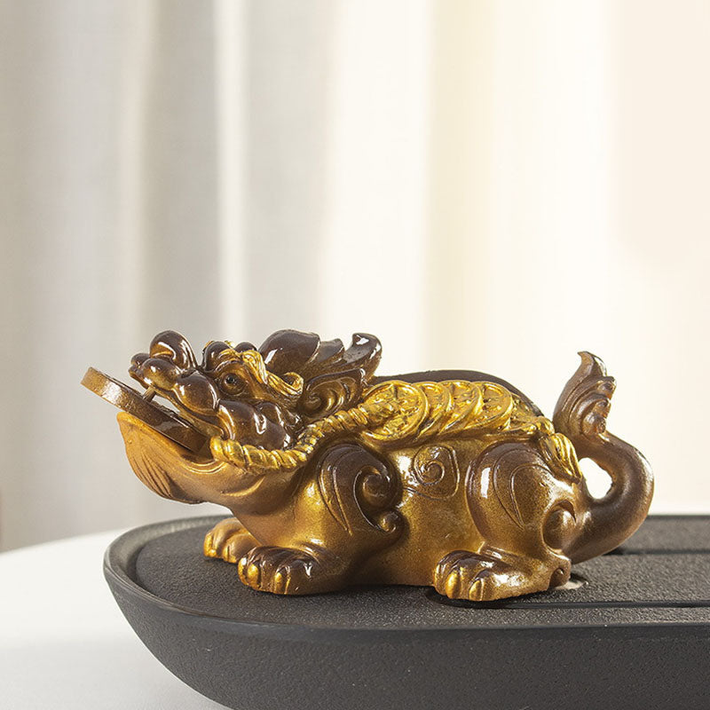 PiXiu Coin Tea Pet – Dark brown reclining PiXiu on black tea tray, white curtain backdrop