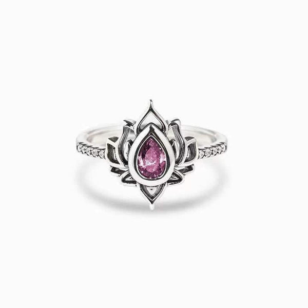 Lotus Zircon Ring – vivid pink stone lotus on white background, zircon