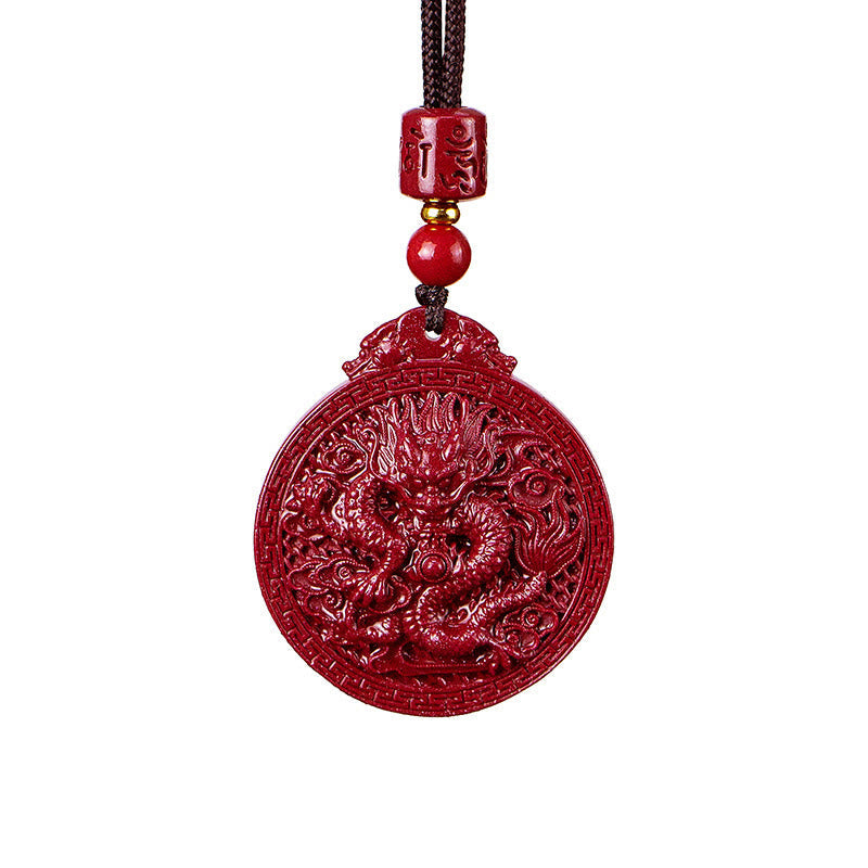 Cinnabar Dragon Pendant – Clean product shot of carved dragon medallion with dragon head bail, Authentic