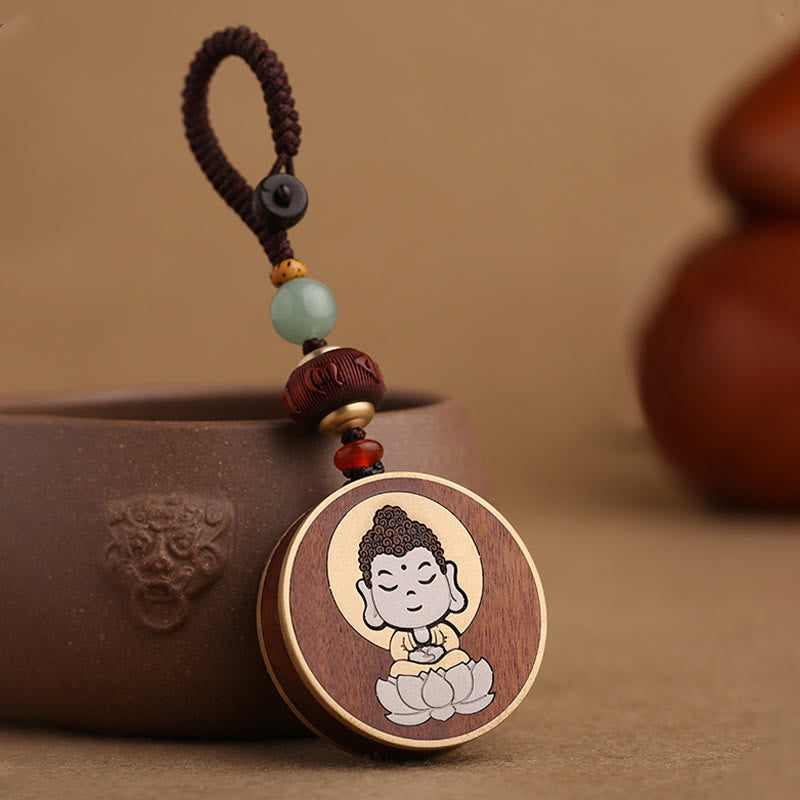 Ebony Avalokitesvara Keychain – three-quarter angle showing pendant thickness and edge bevel, craft detail