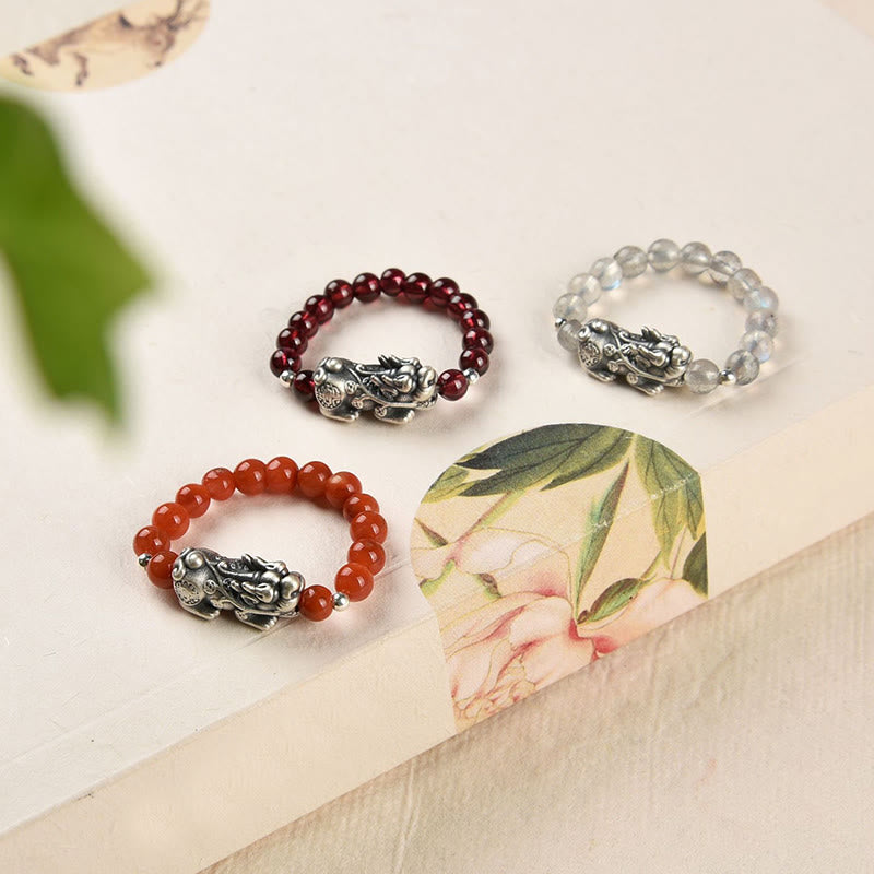 Silver Garnet PiXiu Ring – Three gemstone rings with silver PiXiu charms on floral paper, gift set