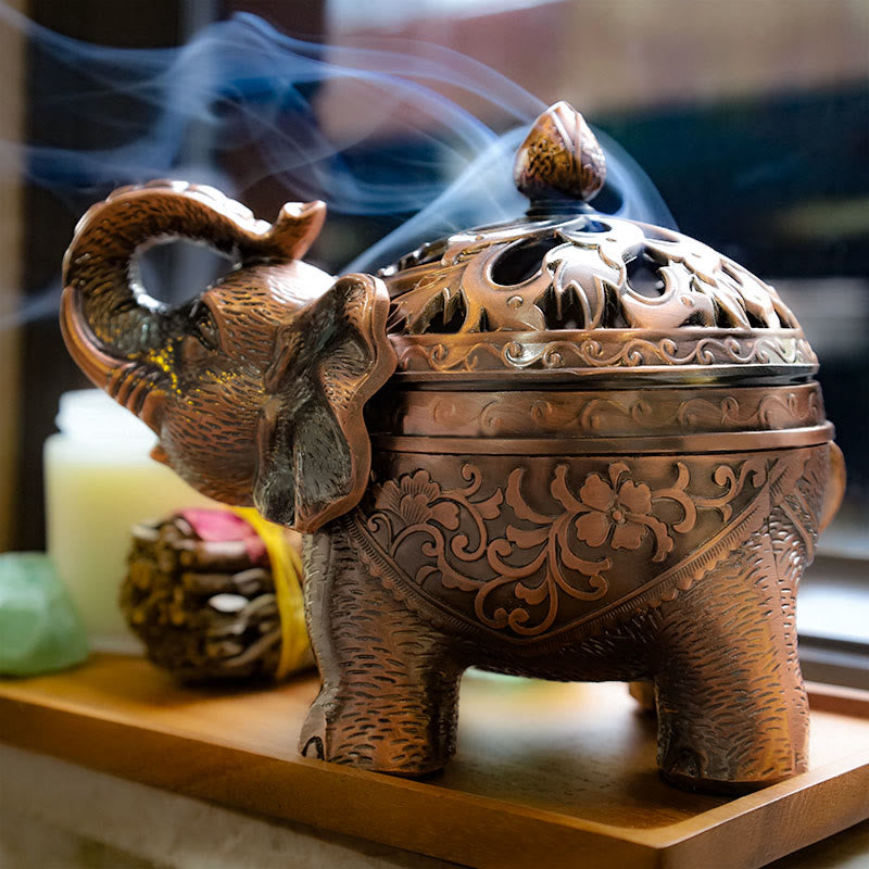 Elephant Alloy Incense Burner – smoke rising on wooden stand, Wise