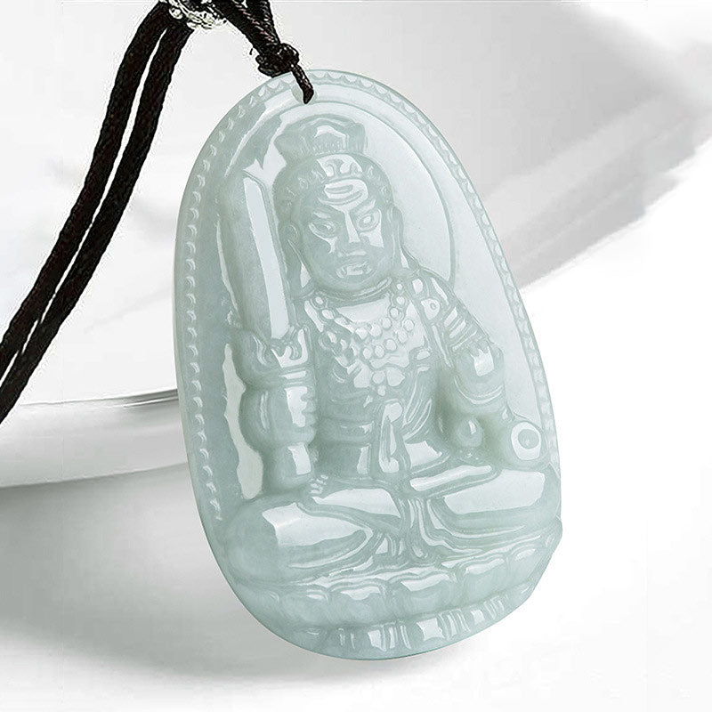 Zodiac Buddha Jade Necklace – front closeup of Buddha jade pendant holding sword, fierce guardian protector carving