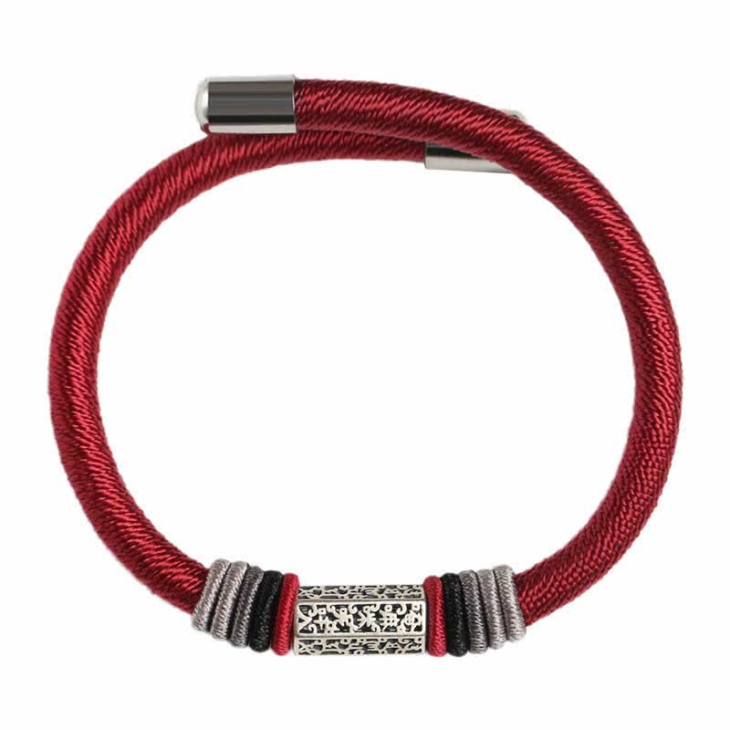 Om Mani Padme Hum Red Bracelet – Top-down view of full circle with filigree bead and stacked spacers, red rope bracelet
