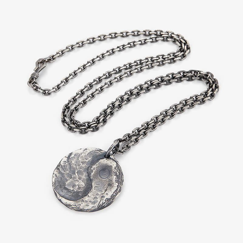 Sterling Silver Yin Yang Necklace – Diagonal hero shot, lobster clasp visible, hammered yin-yang disc charm