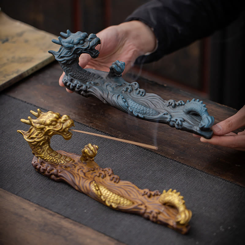 Dragon Protection Incense Burner – gold and verdigris finish comparison, held in hand, artisanal craft