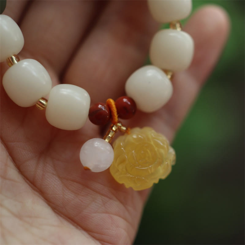 Gradient Bodhi Seed Amber Lotus Bracelet – creamy barrel beads with amber lotus charm, Tranquil