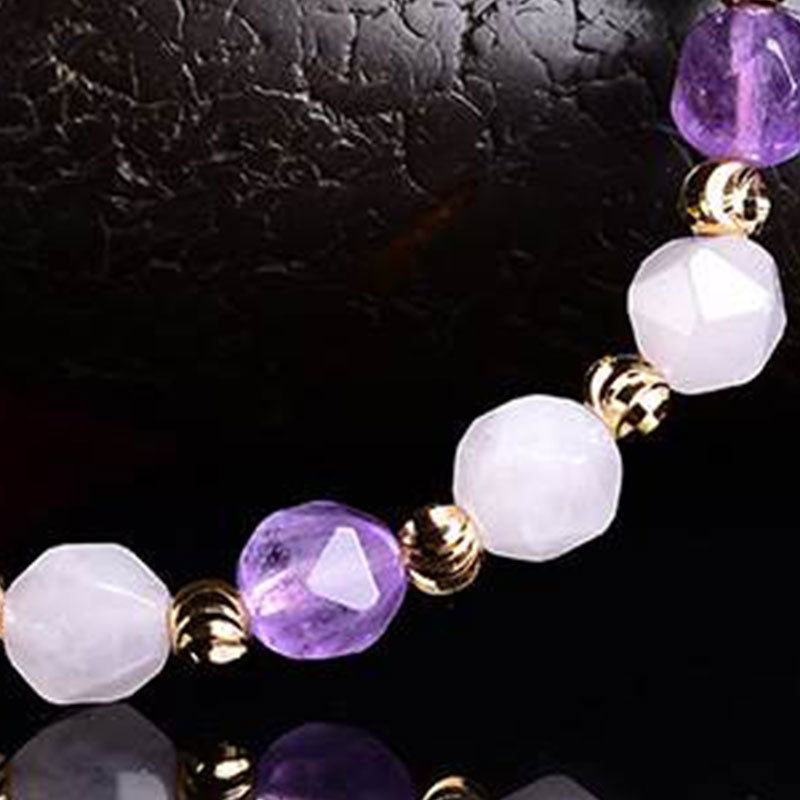 Natural Amethyst Pixiu Bracelet – macro beads close-up, faceted amethyst and white crystal with gold spacers