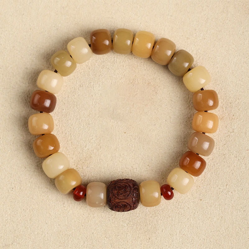 Natural Bodhi Seed Om Mani Padme Hum Wisdom Bracelet - Amber to brown gradient, carved center