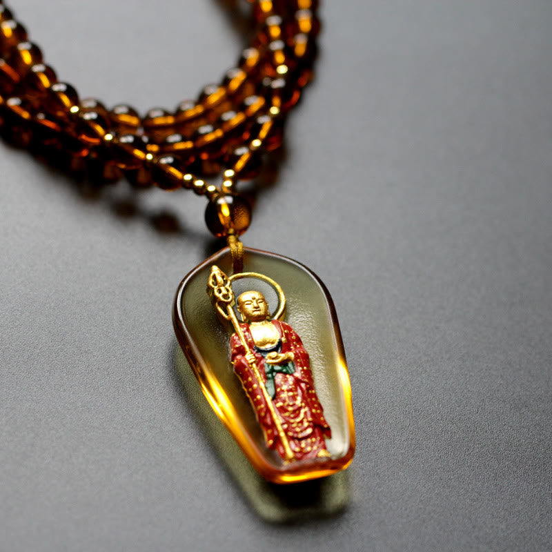 Ksitigarbha Buddha Liuli Crystal Necklace – Intricate crystal amulet with compassion mantra engraving, sacred gift