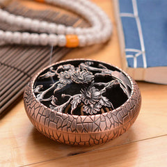 Plum Incense Burner - Copper censer with chrysanthemum openwork lid, smoke rising, styled with prayer beads, zen incense burner