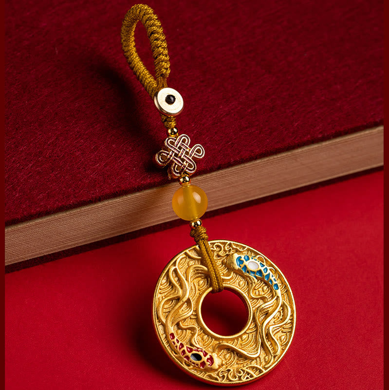 Koi Peace Buckle Keychain - lifestyle shot with keys and bag, daily luck charm